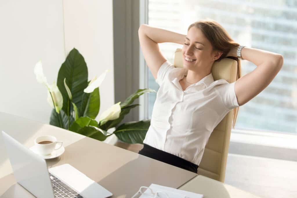 businesswoman having positive feelings about work