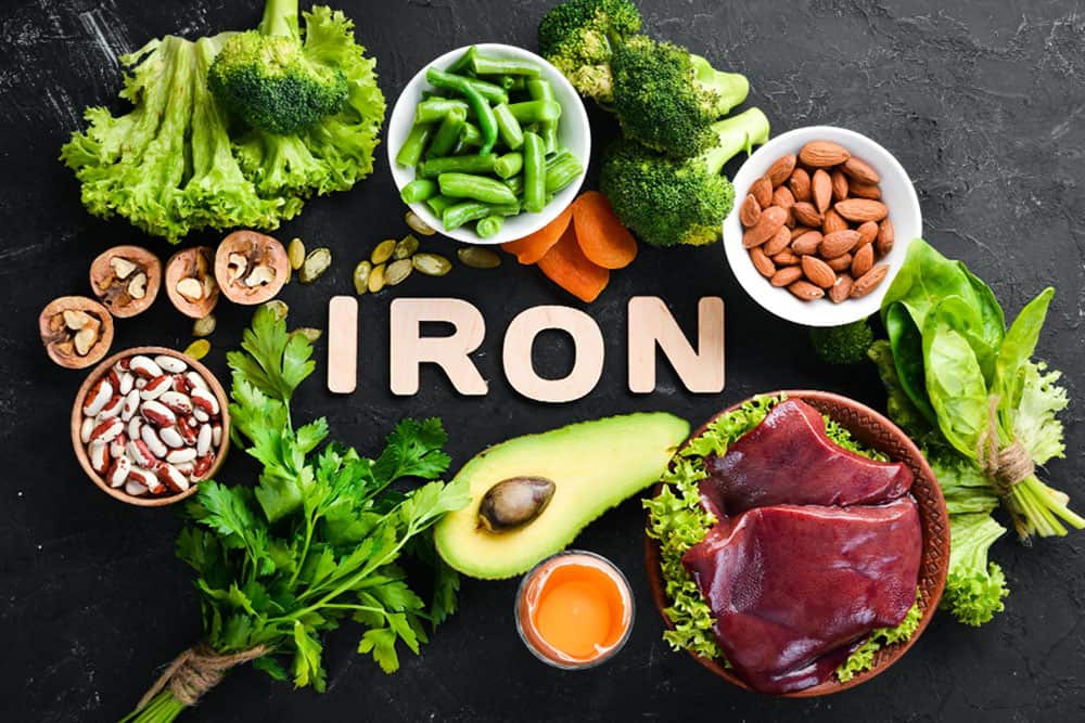 food containing natural iron black stone background top view