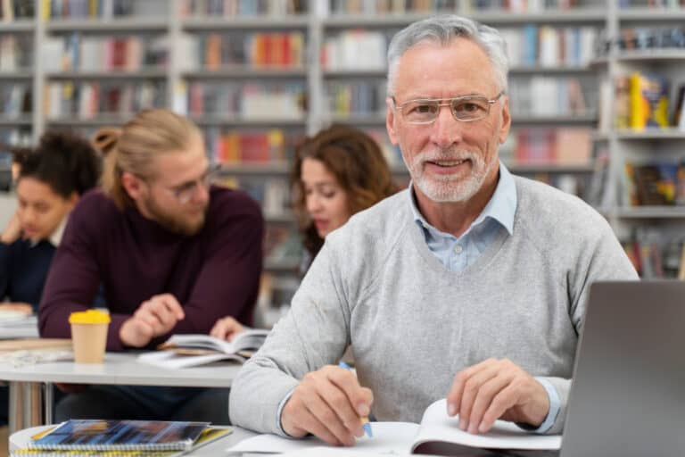 man learning with laptop